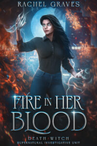 Cover of Fire in Her Blood shows a witch surrounded by flames with white magical energy coming out of her hands.